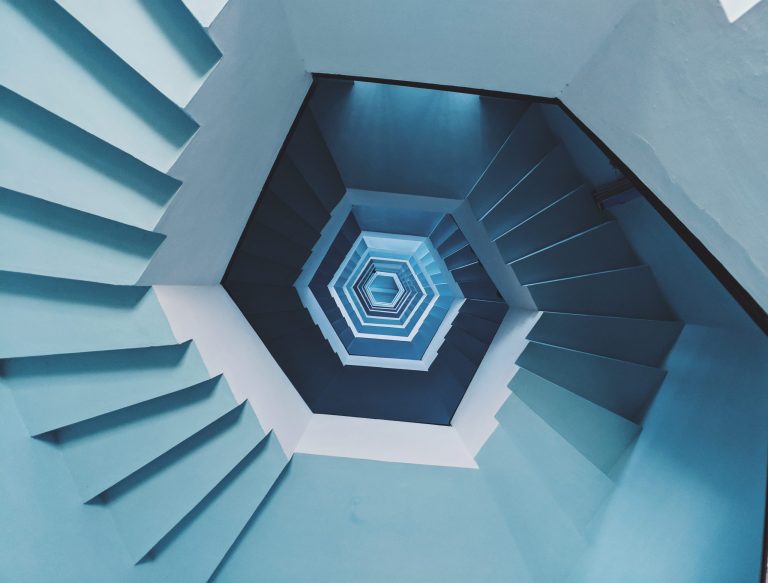 This magnificient view is from the groud floor of Light house in Pondicherry, India. Entire staircase is painted with pastel blue.